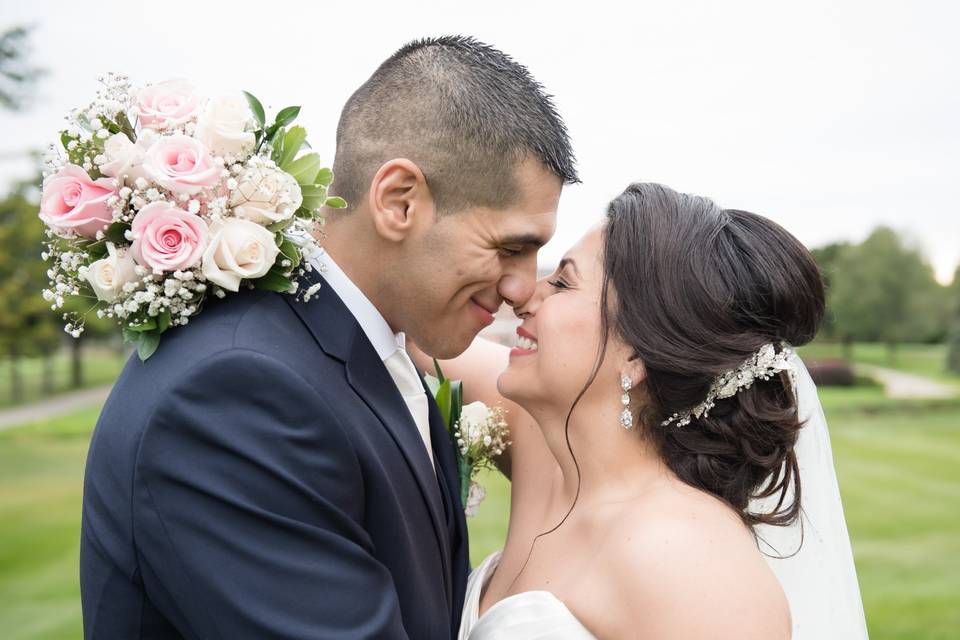 Happy couple with bouquet