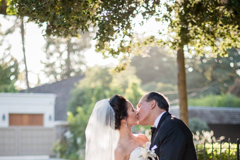 Bride and groom kissing