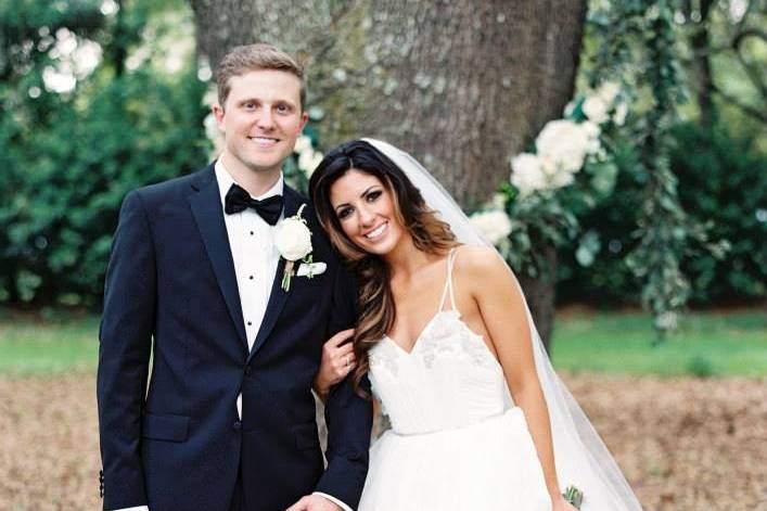 Bride and groom with their dog