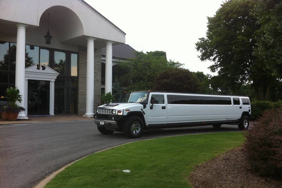 Arctic white hummer super stretch limo