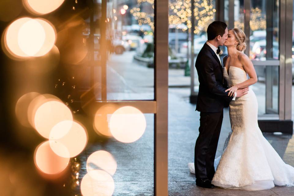 Newlyweds kissing