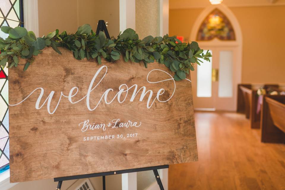 Welcome sign on wood