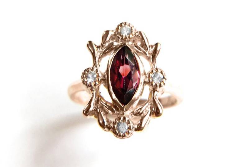14k rose gold anniversary ring, set with diamond and ruby.
