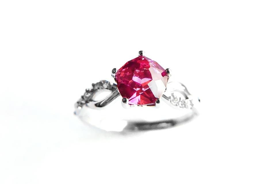 14k white gold engagement ring, set with pink sapphire and white sapphire.