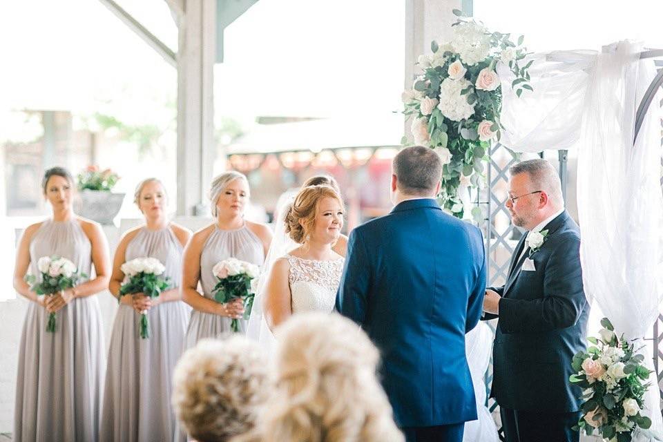 A covered outdoor wedding.