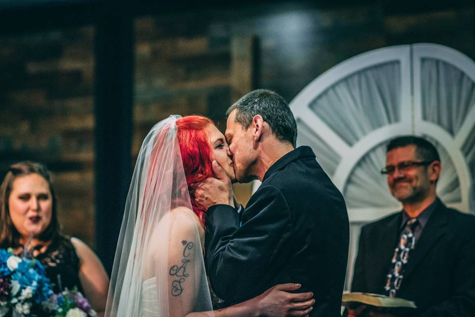 Bride and groom kiss!