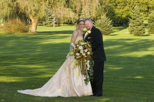 Visit our website, www.thegardenofedenflowers.com to view more of our actual designs. Photograph courtesy of Reflections Creative Photography.