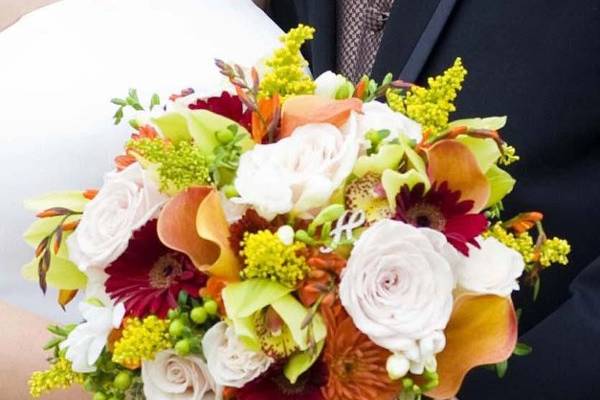 Please visit our website to view more photos of our actual wedding designs. www.thegardenofedenflowers.com  Photograph courtesy of Reflections Creative Photography.