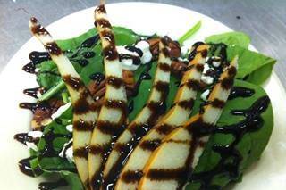 Spinach and Pear salad with candied pecans and balsamic reduction