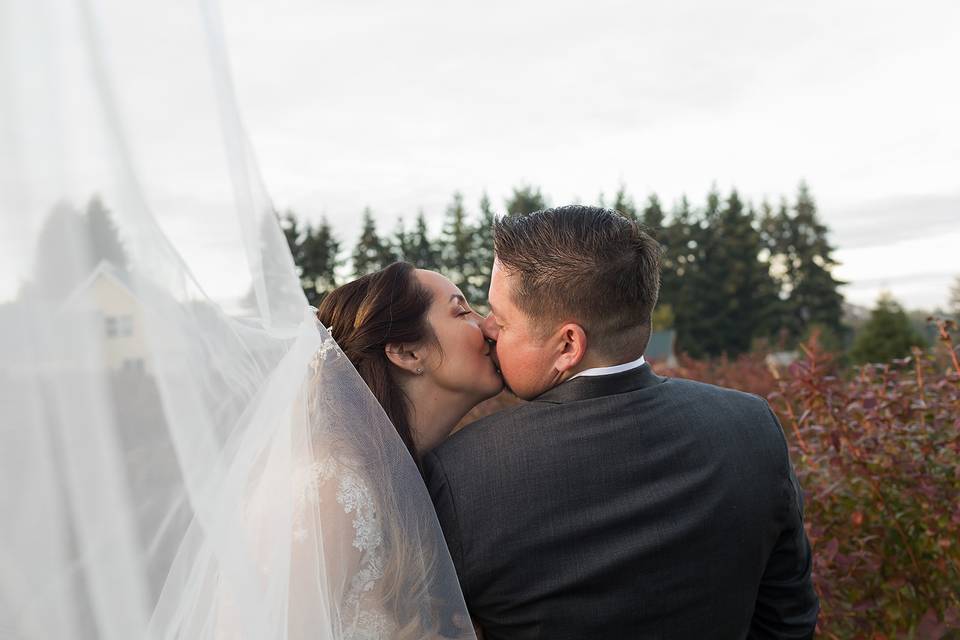 Bride and groom sharing a kiss