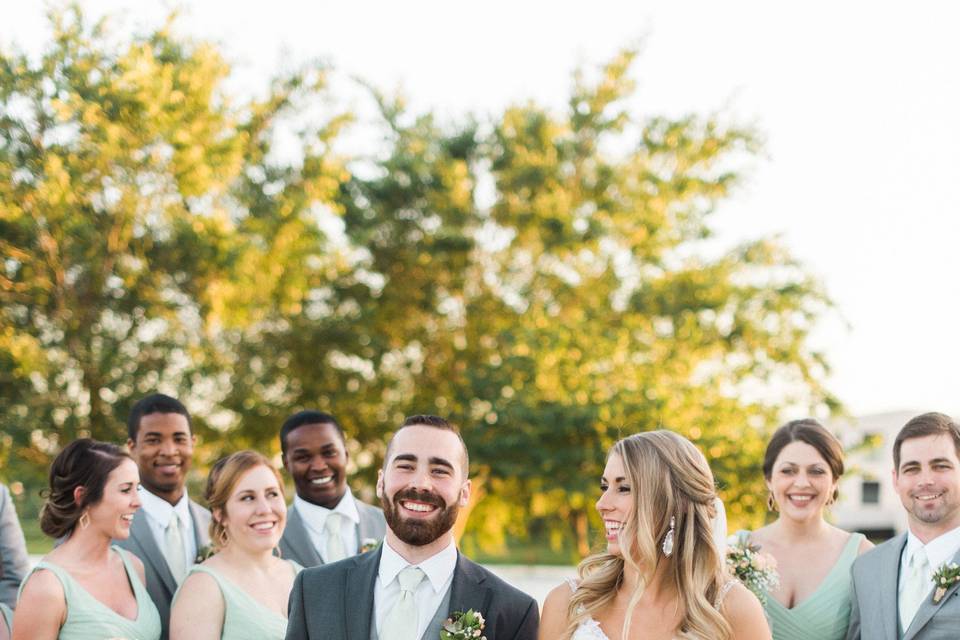 Couple with their bridal attendants