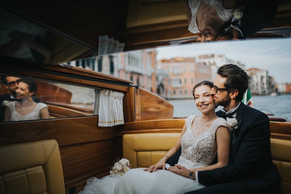 Newly weds in a taxi boat