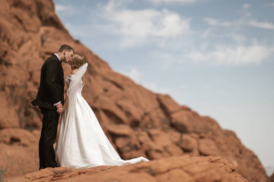 Newlywed Kissing at Red Rock