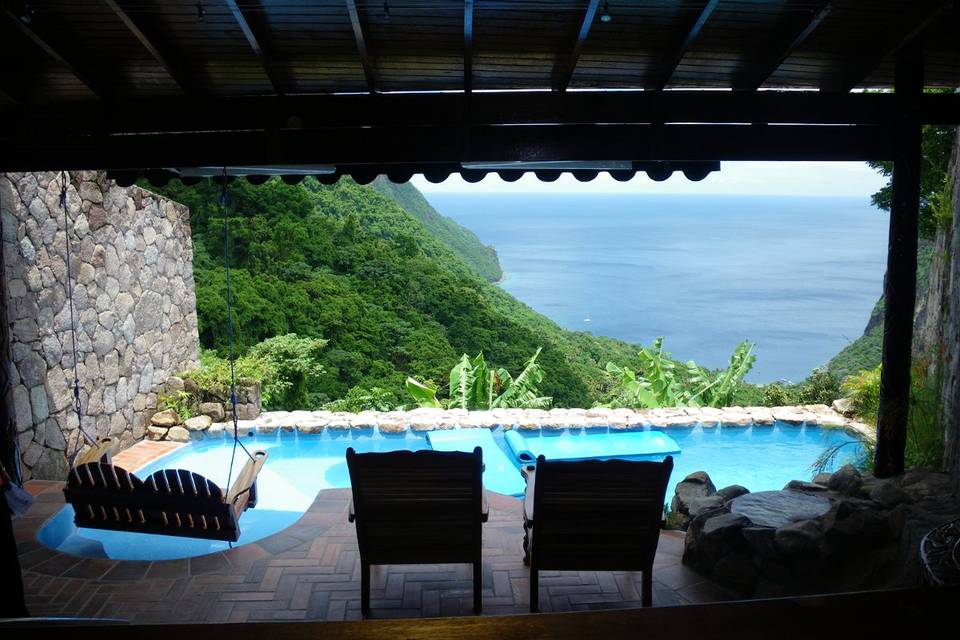 Ladera Resort in luscious St. Lucia from your cliffside escape & plunge pool.