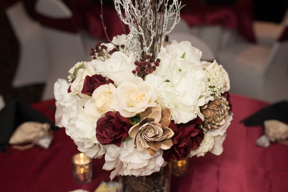 Maroon and ivory centerpiece