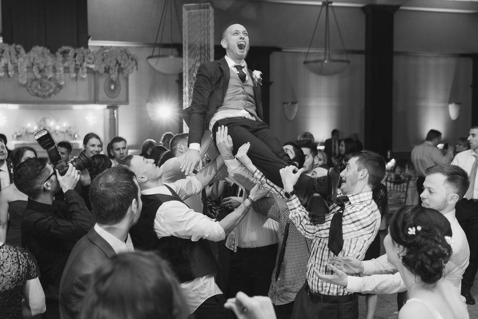 Lifting the groom