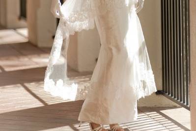 Two tiered tea gown bordered in white Chantilly lace