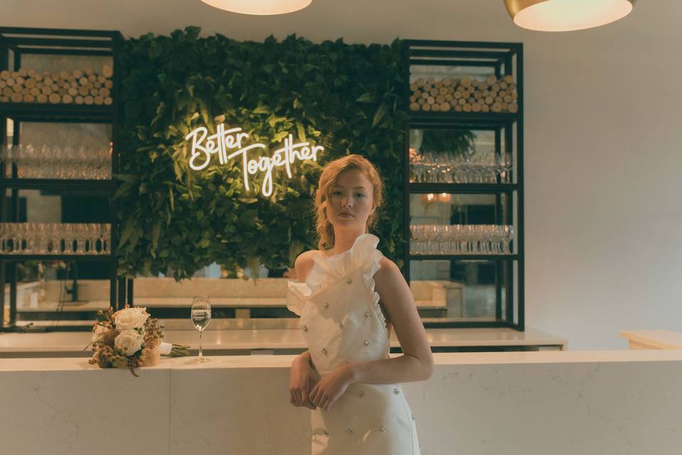 Bride in cocktail space