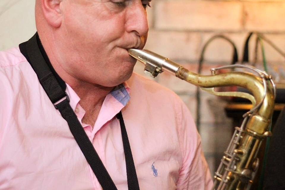 James Banahan playing the saxophone