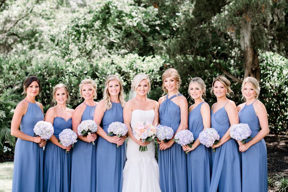 Bride and her bridesmaids in blue