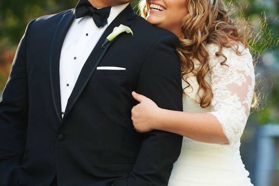 Bride holding her groom