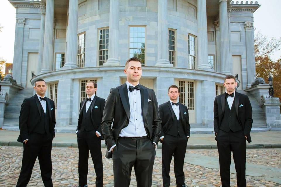Groom and his groomsmen in their tuxedos