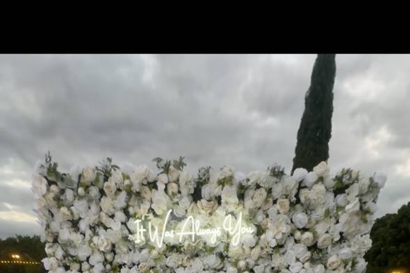 White flower wall & sign