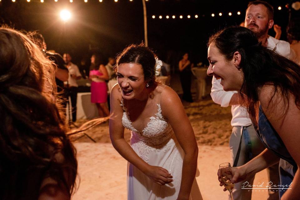 Bride and bridesmaids dance