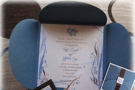 Beach Themed Wedding Invitation with Blue and Brown colors.  Accented with waves, seashells, seahorses and swirls.
