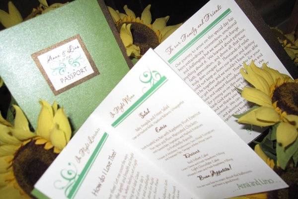Accordian styled Program with Passport style Cover.  Allows you to put all the information you want including Wedding Party, Menu, Program, and thank you note.