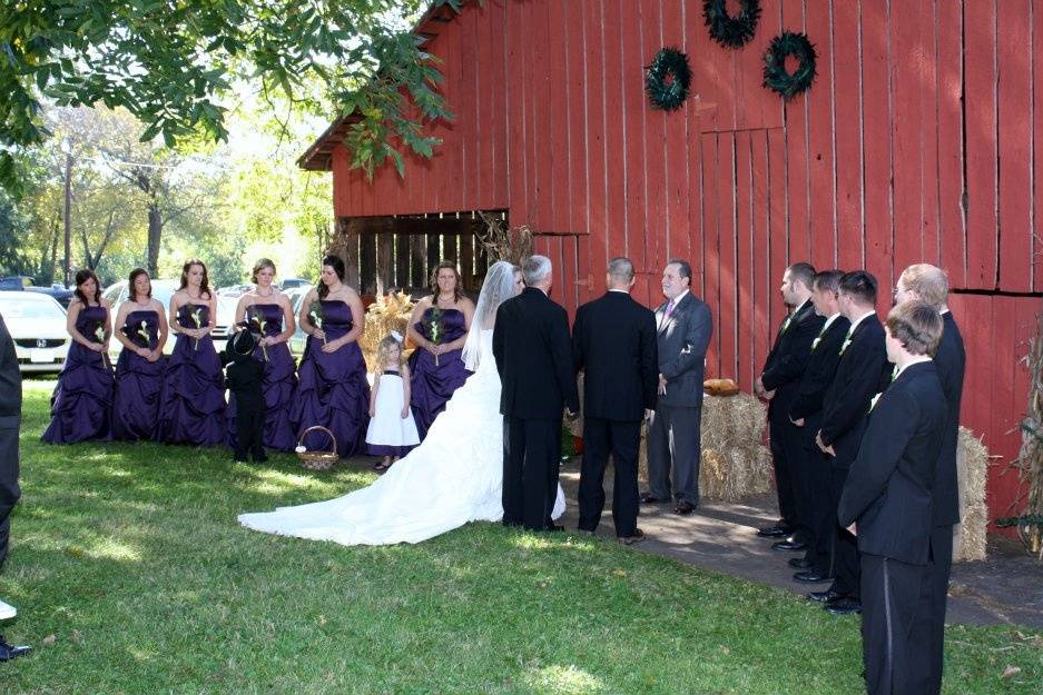 Wedding ceremony by the barn