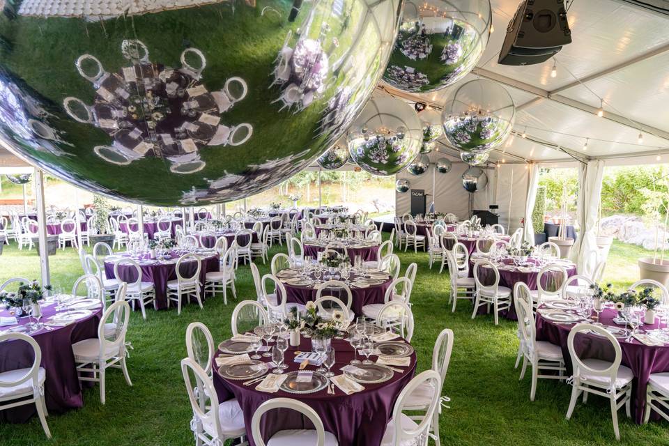Dinner in tent on lawn