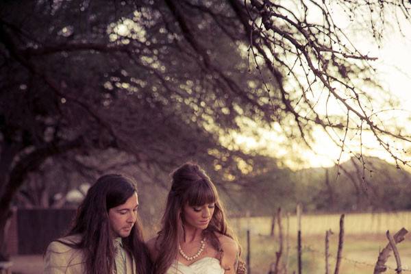 Destination wedding. Outdoor bride and groom portrait with bocquet.