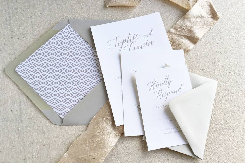 The Alice wedding suite is sophisticated and modern. Shown here in shades of grey, this invitation sets the tone for everything from an intimate spring garden wedding to a formal black-tie fete.