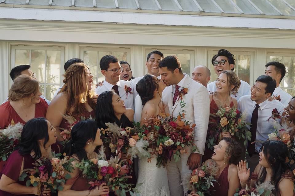 Newlyweds with bridal party