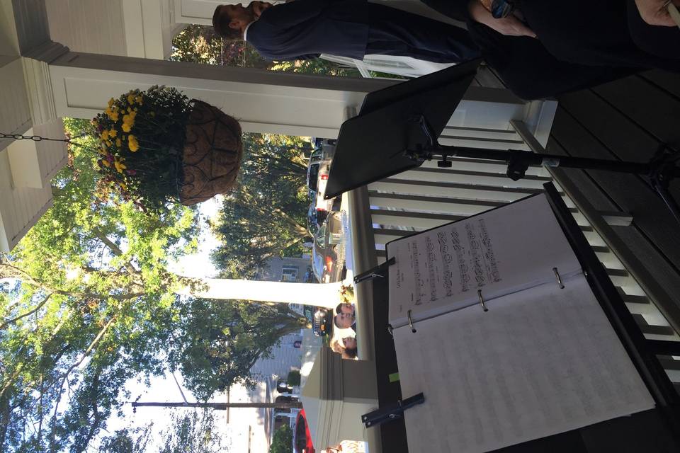Illuminate String Quartet performing on the front porch of our bride and grooms home in Massapequa, NY.