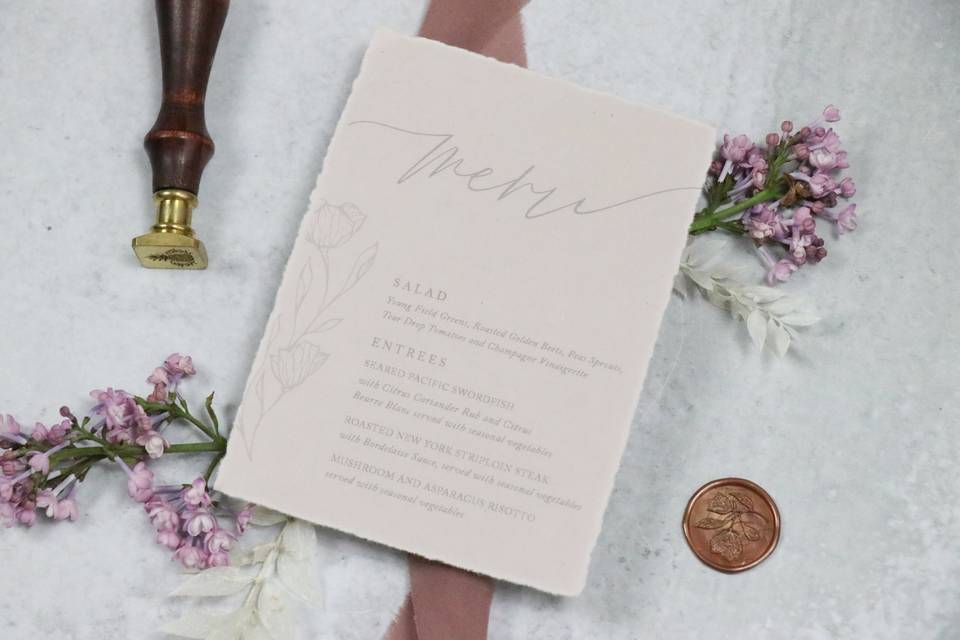 Floral line art on blush paper