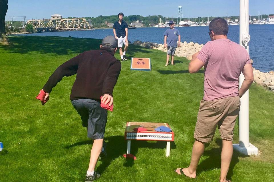 Corn hole on the lawn