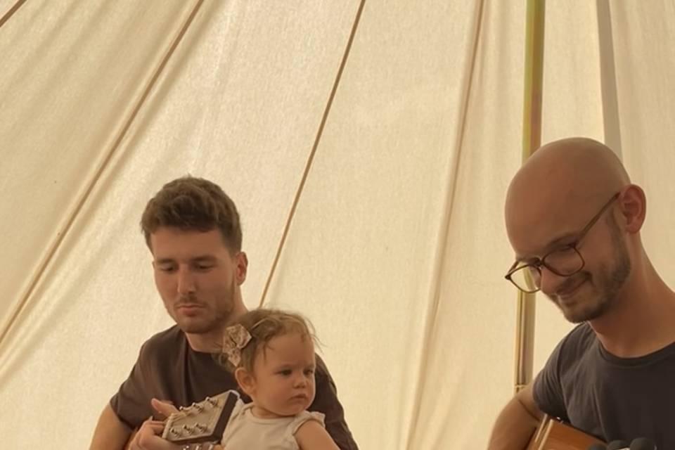 Playing guitar with a baby
