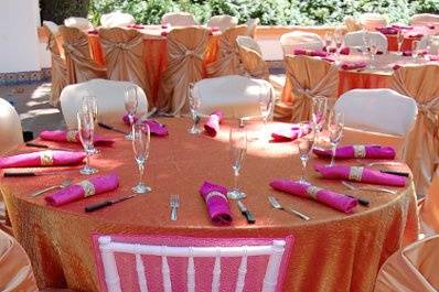 Lavender satin linens with cake table in back, Pelican Hill Hotel and Resort outdoor wedding reception