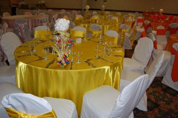 Gold linen sweetheart table, draping and stage linens