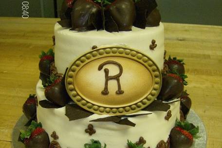 2 tier round with plaque and fresh chocolate dipped strawberries.