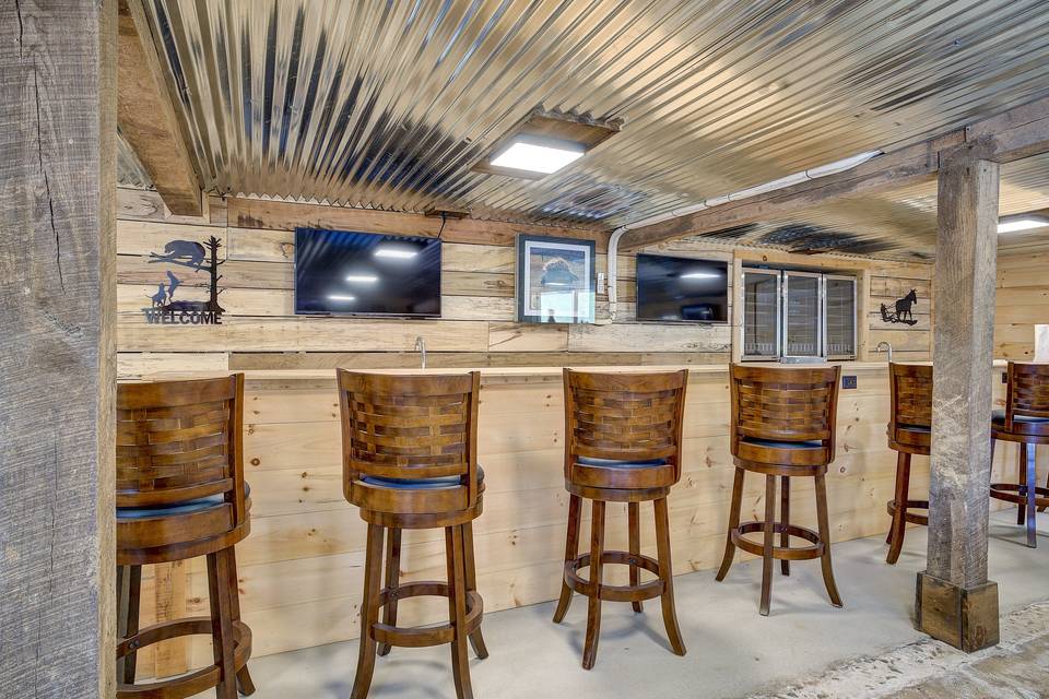 Downstairs bar with TVs