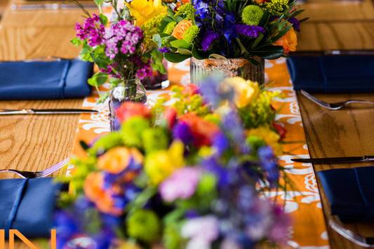 Wooden tables and wild flowers.