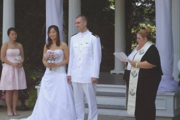 The groom and all the groomsmen are officers in the US Navy.