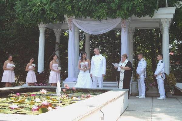 The groom and all the groomsmen are officers in the US Navy.