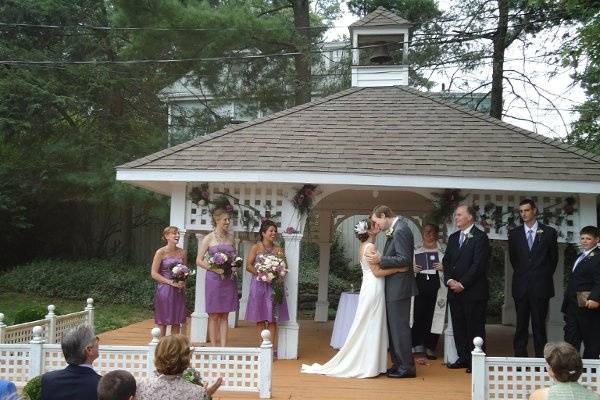 A beautiful wedding in mid-summer with royal purple as the color for the bridesmaids.
