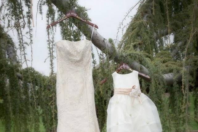 The bride's dress and her daughter's flower girl dress.Photo by Clark Photography