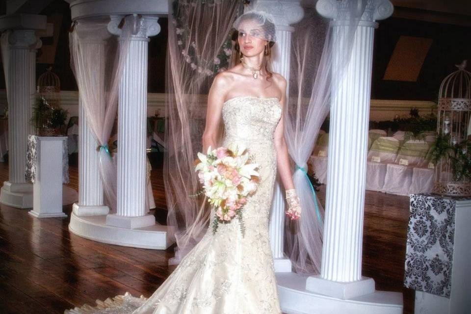 The bride's dress and her daughter's flower girl dress.Photo by Clark Photography