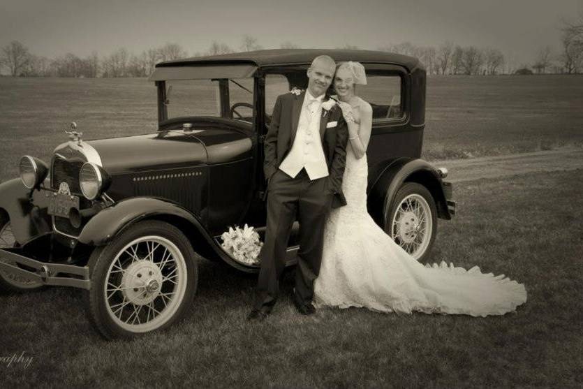 Vintage couple with a 1929 Model A Ford.Photo by Clark Photography